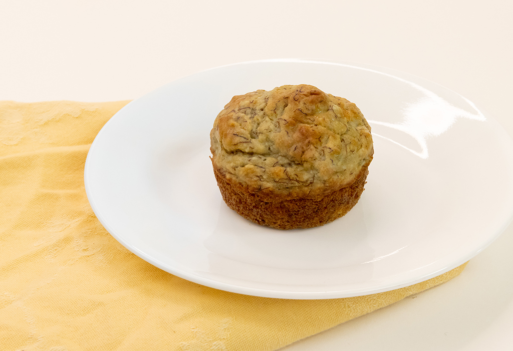 One Banana Muffin on a white plate
