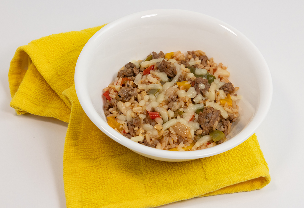 A bowl of Beef and Pepper Skillet on a yellow napkin