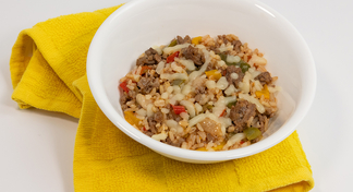 A bowl of Beef and Pepper Skillet on a yellow napkin