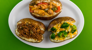 3 potatoes topped with "One Pan Fajitas", one topped with "Sloppy Joes", one topped with "Steamed Broccoli with Grated Cheese"