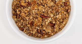 A white bowl filled with easy homemade granola