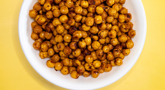 A white bowl filled with roasted chickpeas
