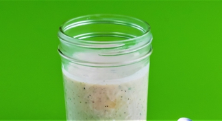 A glass jar of ranch dressing