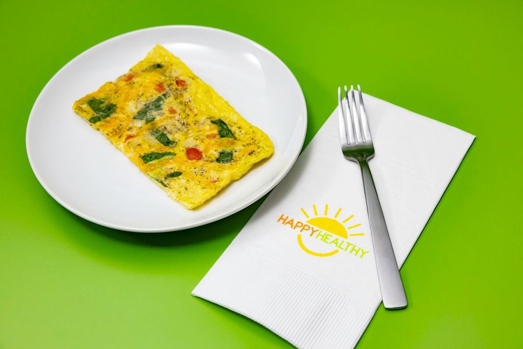 A plate with one segment of sheet pan eggs