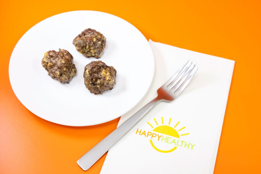 A white bowl of Baked Meatballs