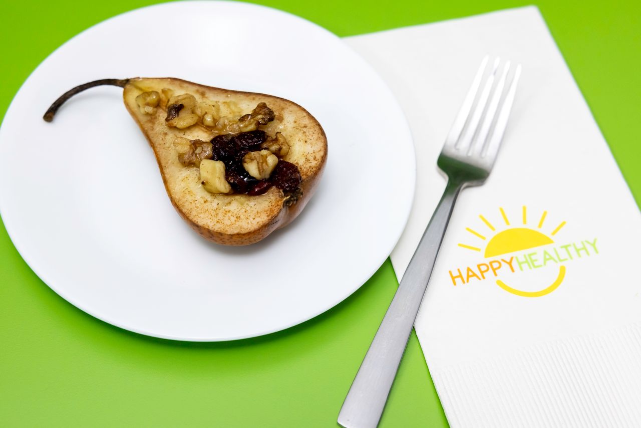 A white plate with 1 Easy Baked Pear