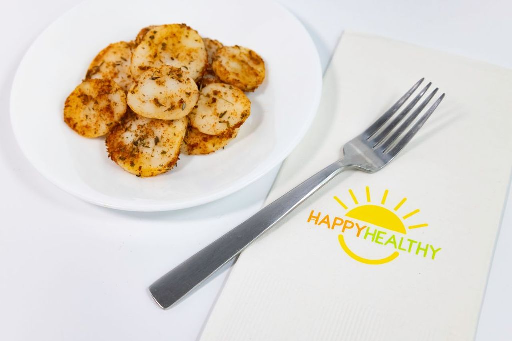 A white plate loaded with Spiced Up Potatoes