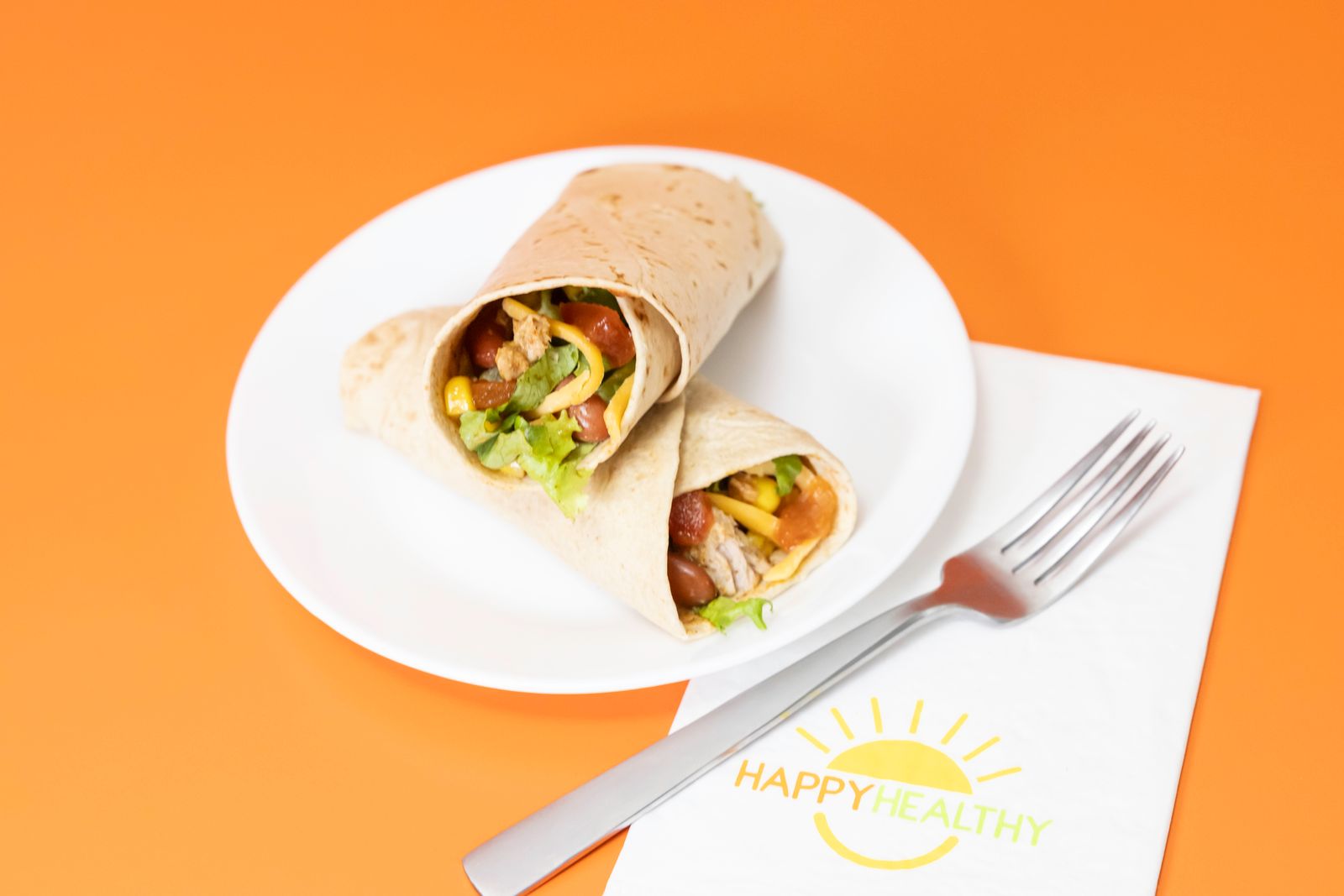 A white plate with A Tuna Roll Up