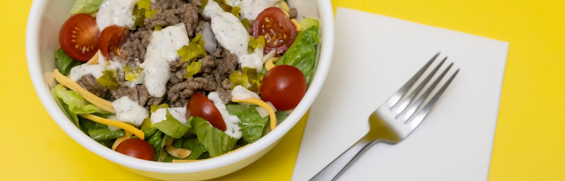 A white bowl of Burger in a Bowl