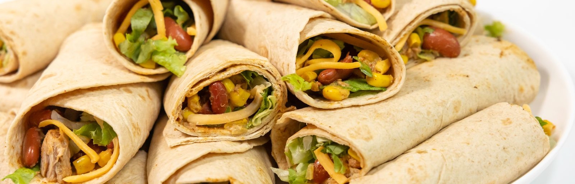 A white plate filled with Tuna Roll Ups