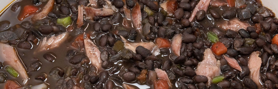 a bowl of Slow Cooker Smoked Turkey with Black Beans
