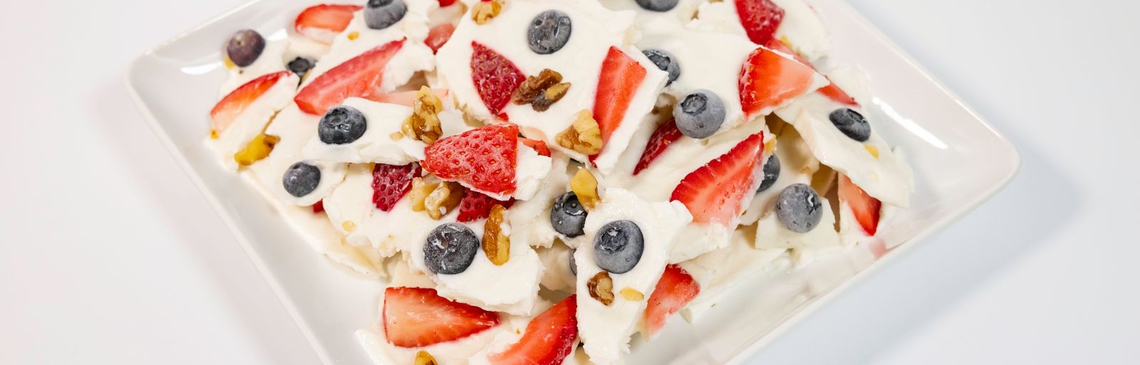 A white plate filled with Frozen Yogurt Bark