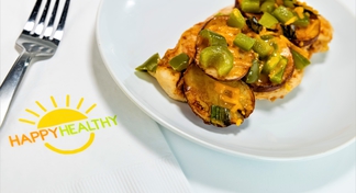 BBQ Cheddar and Chicken Packets plated with side salad with fork on HappyHealthy napkin.