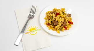 A plate of beef and noodles