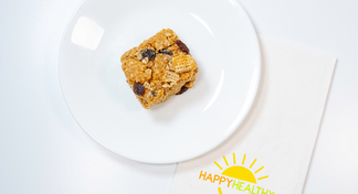 A white plate with one Peanut Butter Cereal Bar