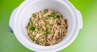 A crock pot of Salsa Verde Chicken