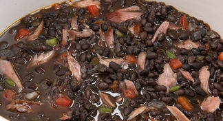 a bowl of Slow Cooker Smoked Turkey with Black Beans