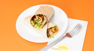 A white plate with A Tuna Roll Up